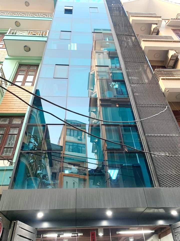 Bán tòa nhà Phố Trung Kính 75m2 7T MT 5m 19.5 tỷ, ô tô tránh vỉa hè kdoanh