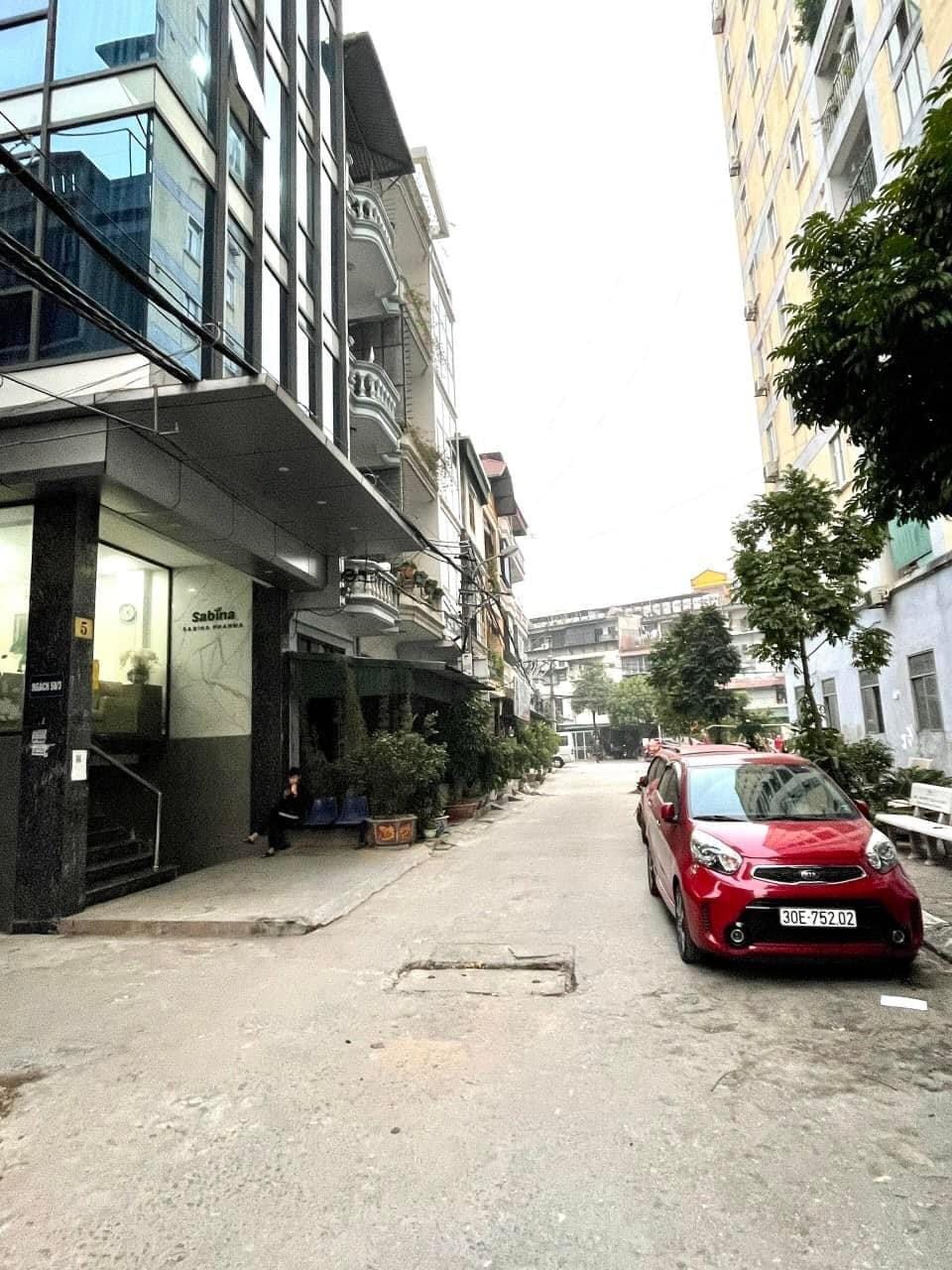 Tòa nhà văn phòng 8 tầng Trần Vỹ 62/80m2, MT 5m2, lô góc 3 thoáng, 2 ô tô tránh, 21.5 tỷ