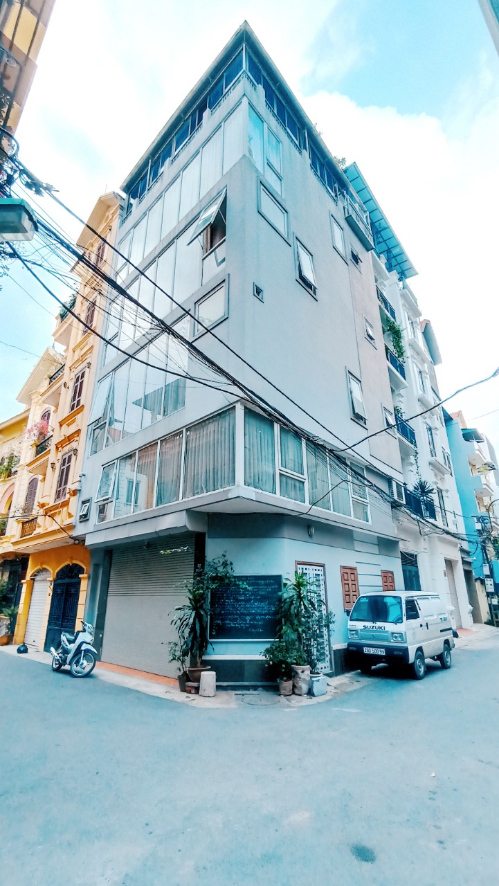 Bán Gấp nhà Lô góc 7 tầng phố Nguyên Hồng 100m2 giá 30 tỷ