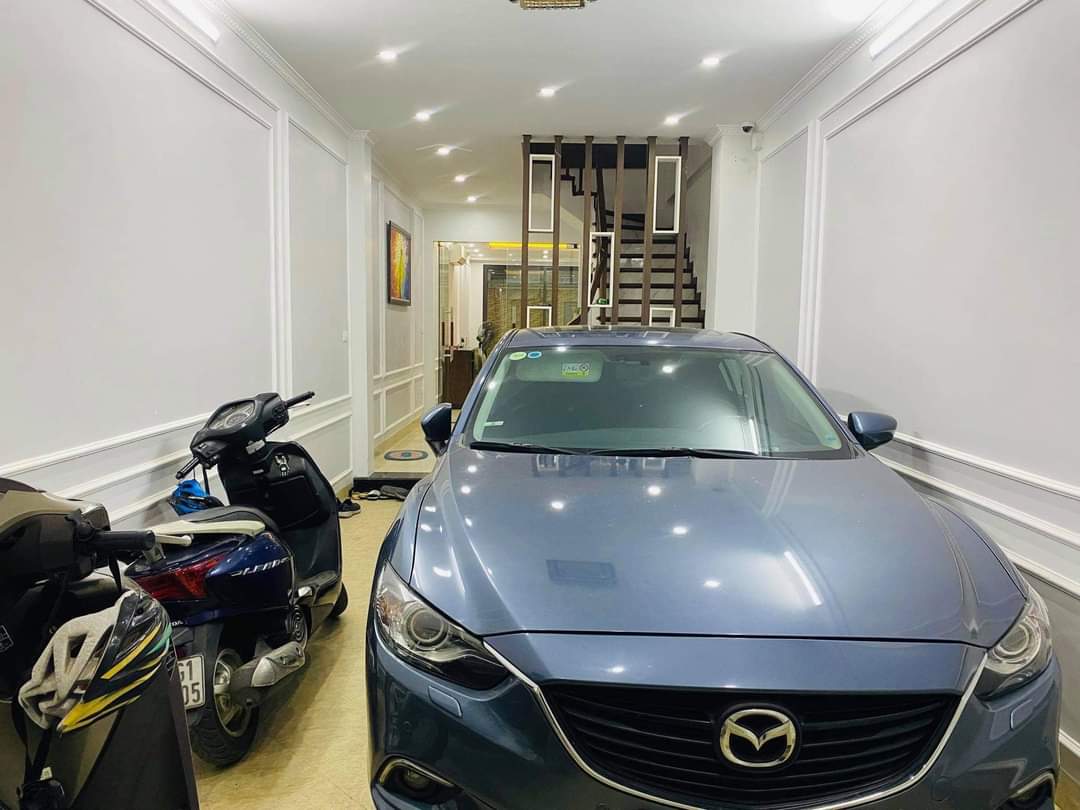 Bán gấp, ô tô vào nhà Hai Ba Trưng 56m x 5 tầng, MT 4,9 m, giá 12,9 tỷ