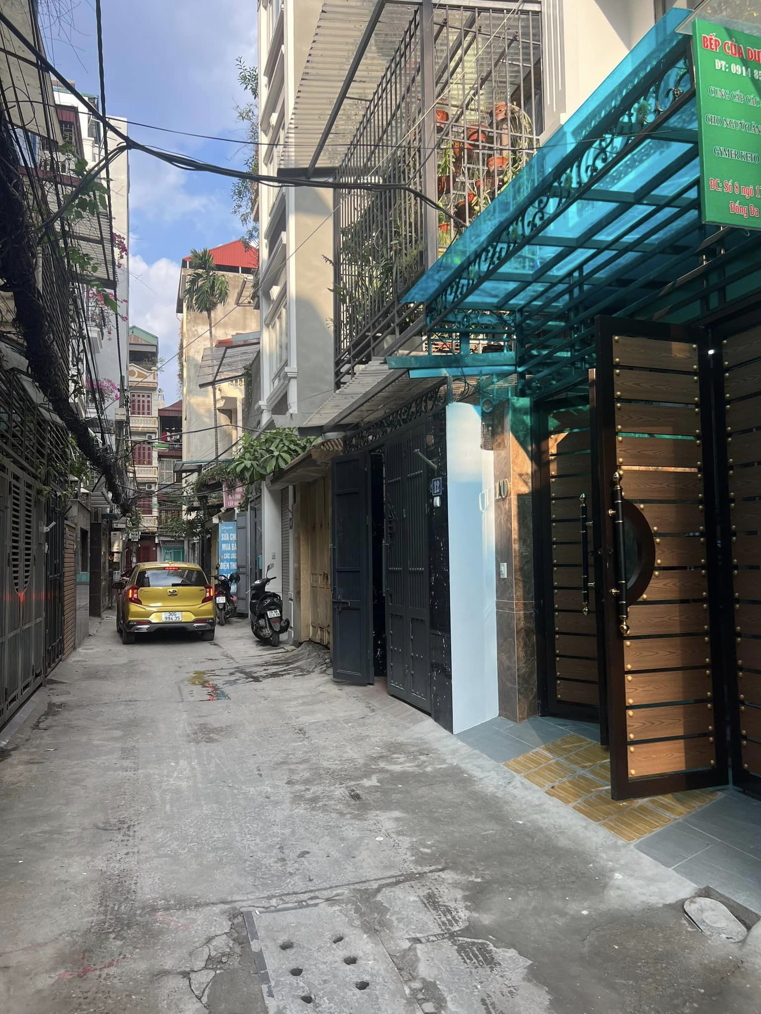 Thái Thịnh, Đống Đa. 61m2 x 5T. Thang máy. Ngõ thông, ô tô đỗ cửa. Cách phố 15m.