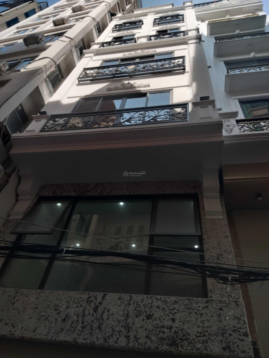 Bán nhà mặt ngõ 61 Hoàng Cầu DT 62 m2 x 6 T mới đẹp kinh doanh tốt giá 26 tỷ ô tô 7 chỗ vào nhà