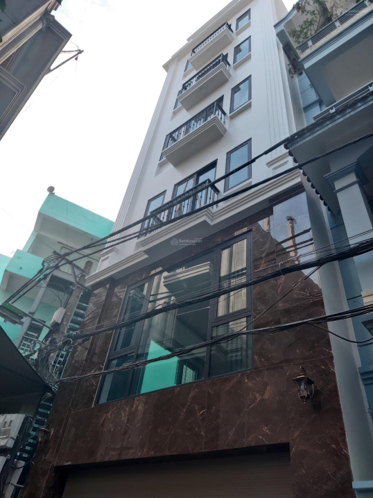 Bán nhà plô Đường Huỳnh Thúc Kháng,Nguyễn Chí Thanh dt 55 m2 x 7 t lô góc 3 mặt thoáng.