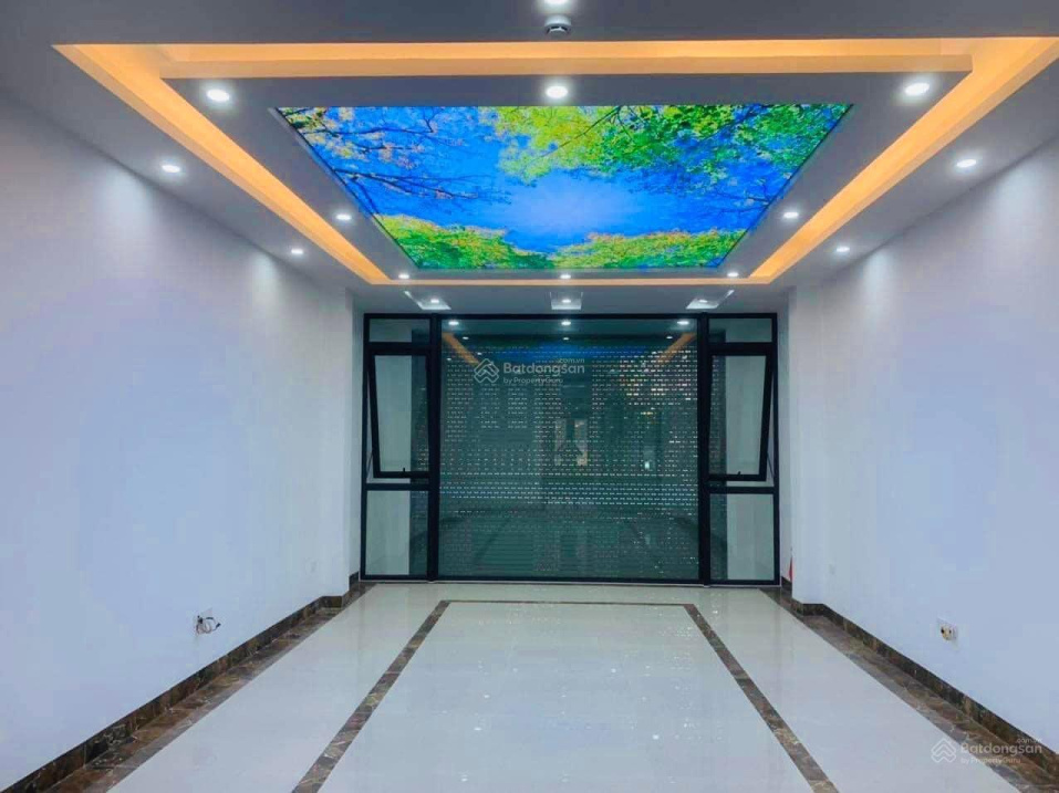 Tòa nhà văn phòng 7 tầng thang máy, DT 80m2 - MT 5m, vỉa hè ôtô tránh, giá 24 tỷ.
