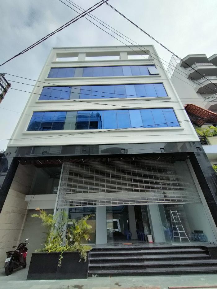Cho thuê tòa nhà văn phòng đường Hoàng Việt, Phường 4, Quận Tân Bình. 12x20m, hầm, 7 tầng
