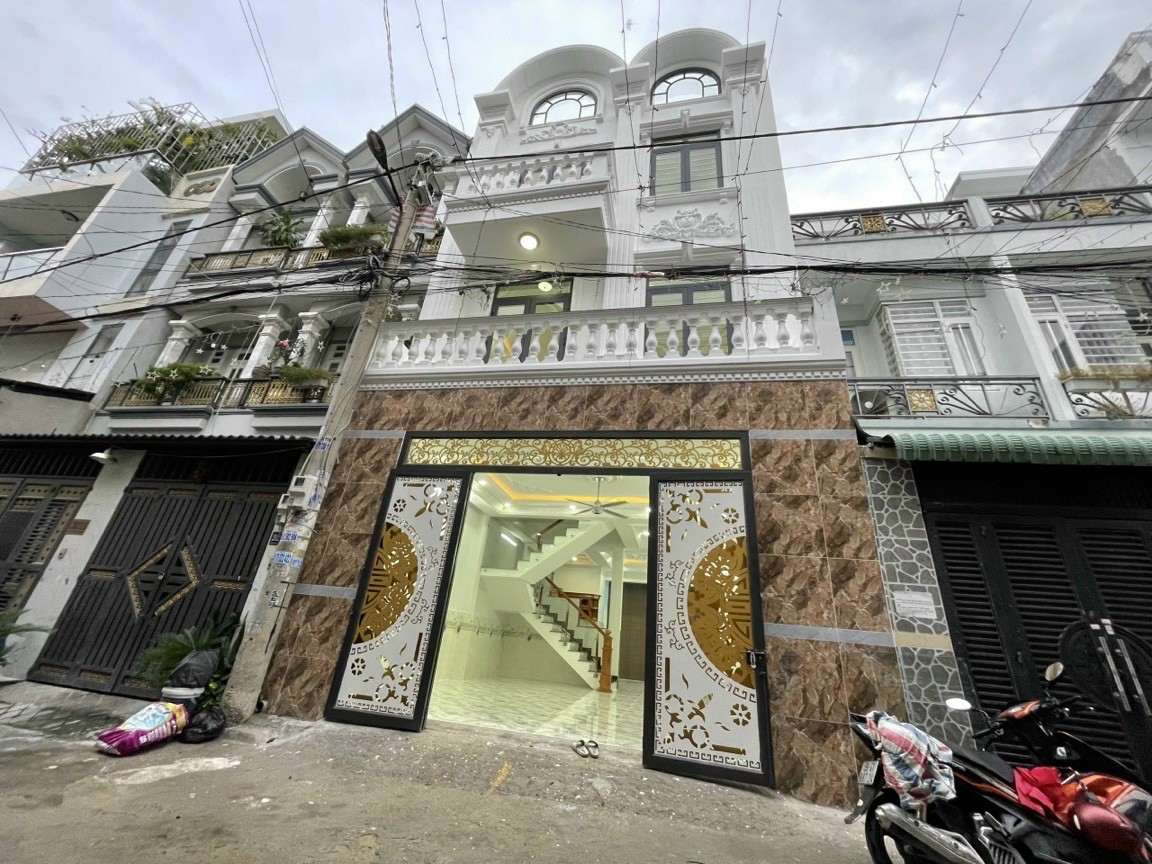 Bán nhà P. Tân Chánh Hiệp 4 Lầu có gara để xe.