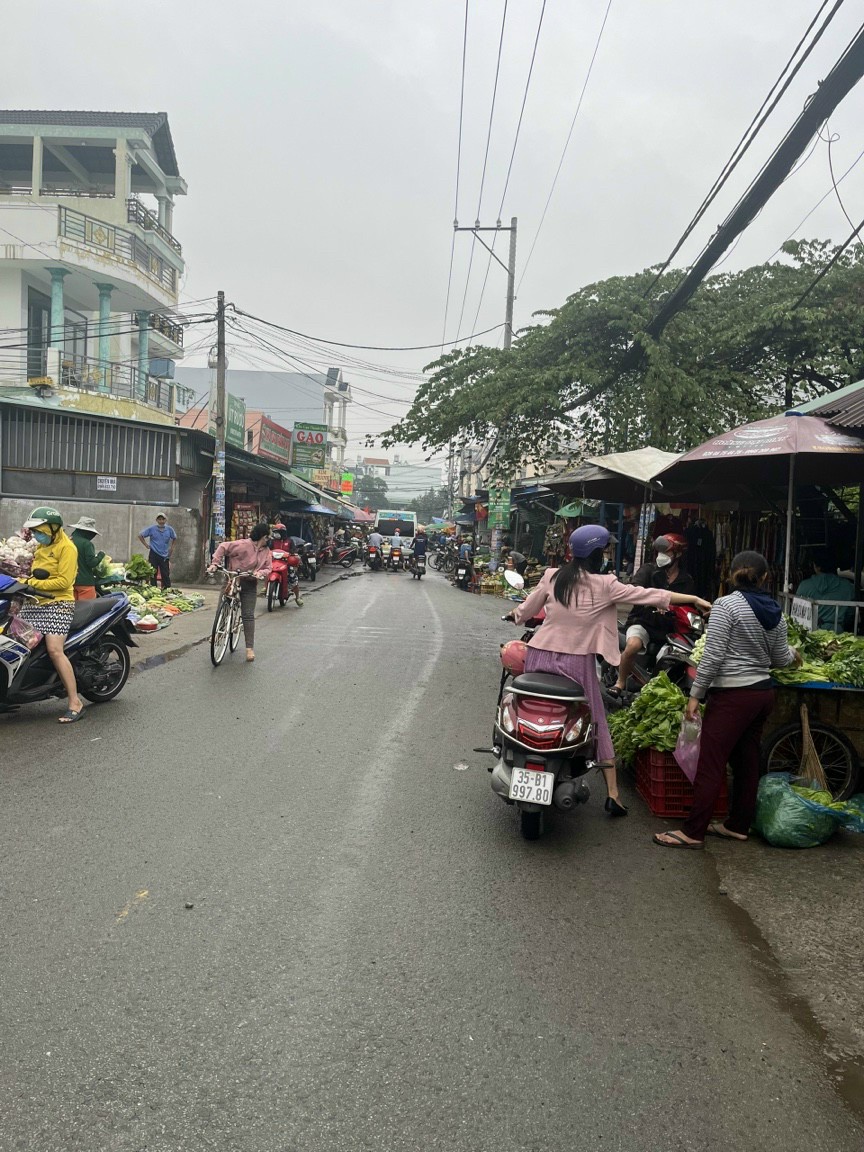 Nhà góc 2 mặt tiền chợ Tân Chánh hiệp.