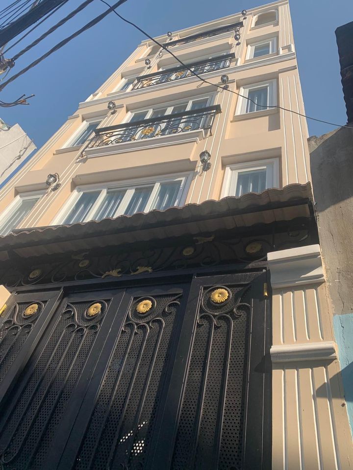 Nhà Nở Hậu Ngang Hơn 5m - 5 Tầng - Ra MT Tân Mỹ 20m Kề Lâm Văn Bền Giá 6,xx Tỷ Quận 7