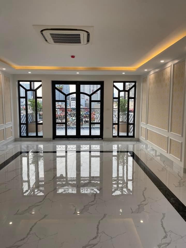 BÁN TOÀ NHÀ 10 TẦNG THANG MAY MẶT PHỐ ĐỐNG ĐA, THIẾT KẾ THÔNG SÀN KINH DOANH