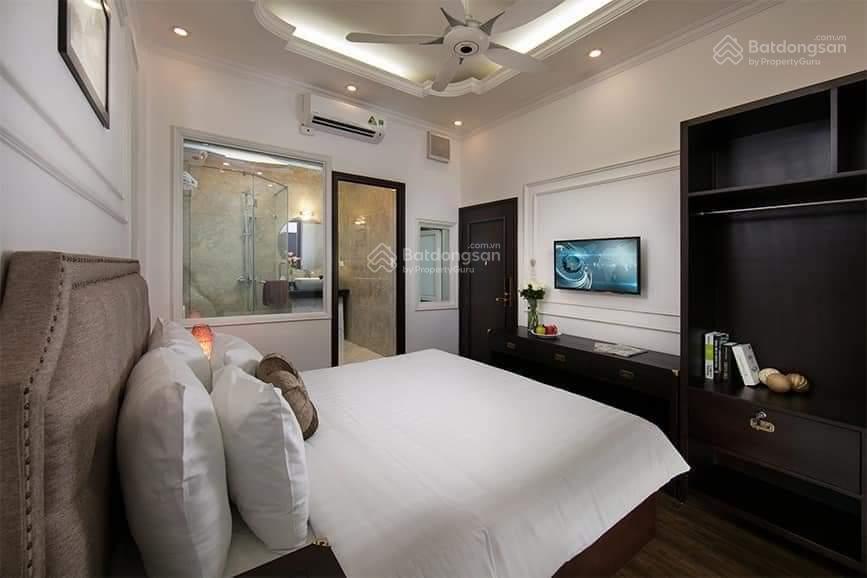 Bán nhà toà căn hộ dịch vụ phố Vương Thừa Vũ gara ô 240m2 mặt tiền 13m 7 tầng thang máy giá 57tỷ