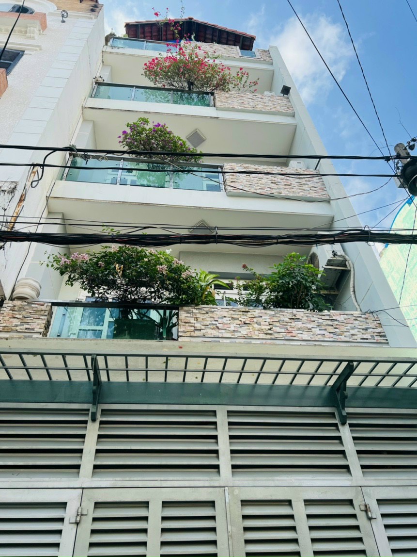 Nhà đẹp 168 Hào Nam đường rộng, ôtô tránh cách 10m. DT45m2x5T, MT4m.