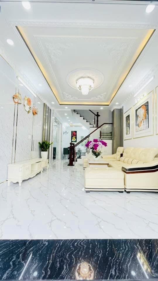 Bán nhà đẹp Dương Cát Lợi,Thị Trấn Nhà Bè, 1 trệt, 2 lầu , 4 pn, 3wc , có sân để xe,Dt 52m.