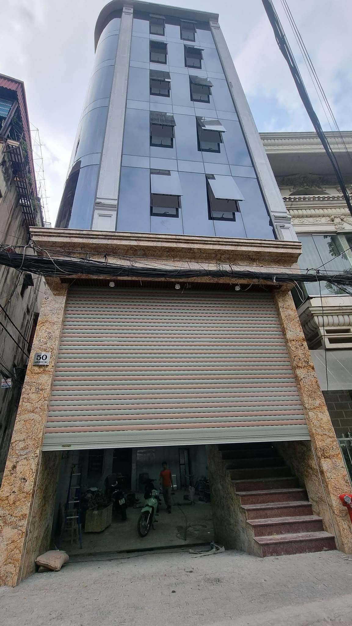 Bán Tòa Văn phòng Lô Góc Hoàng Quốc Việt 125M2 8 Tầng Mặt Tiền 6.2M 49 Tỷ