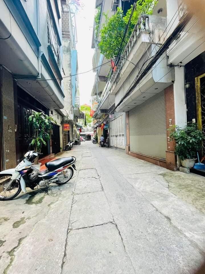 BÁN NHÀ 107 VĨNH HƯNG - OTO VÀO NHÀ - LÔ GÓC - 5 TẦNG - 6 NGỦ