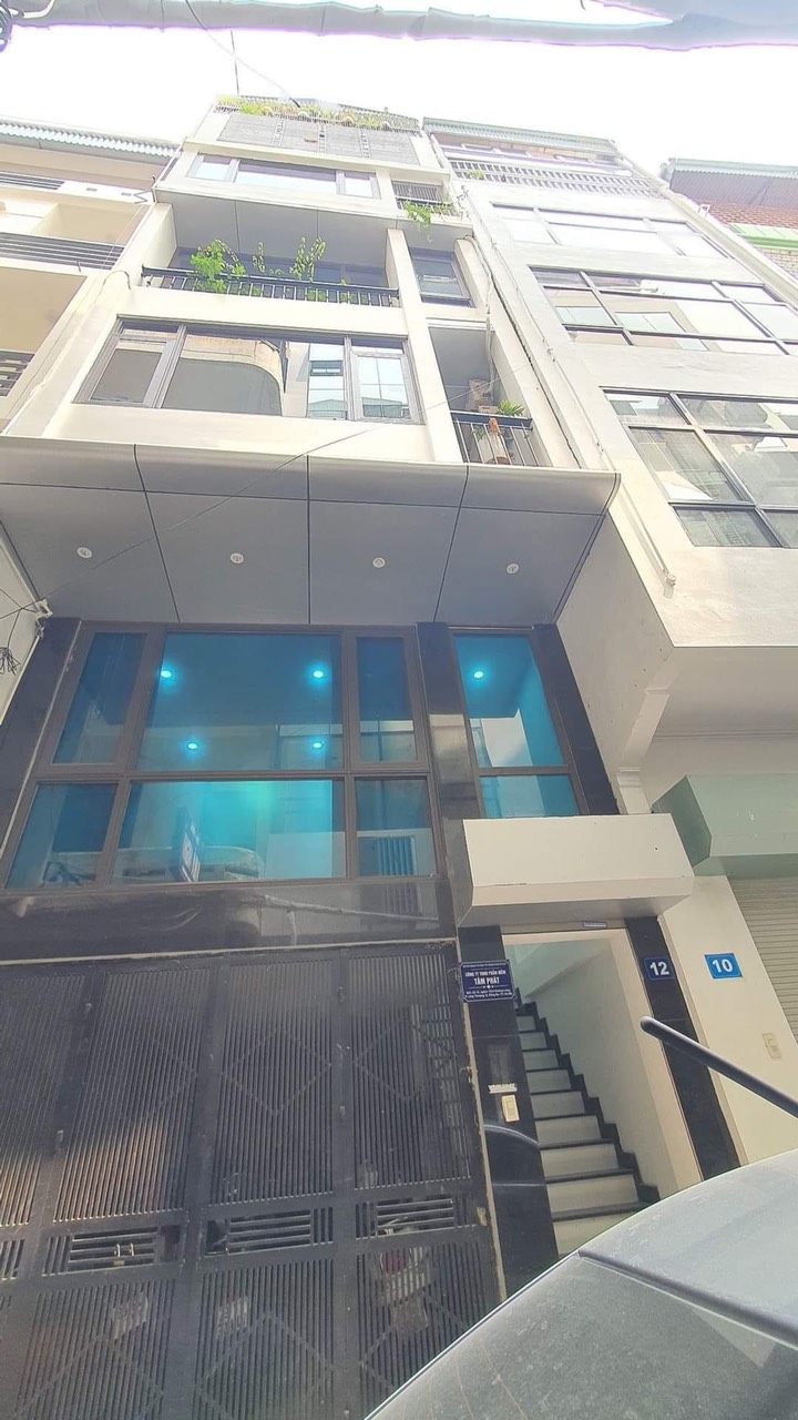 Bán Nhà Đường Láng-Đống Đa 46mx7 tầng ô tô tránh-ngõ thông-kinh doanh gần phố-giá 11,3 tỷ