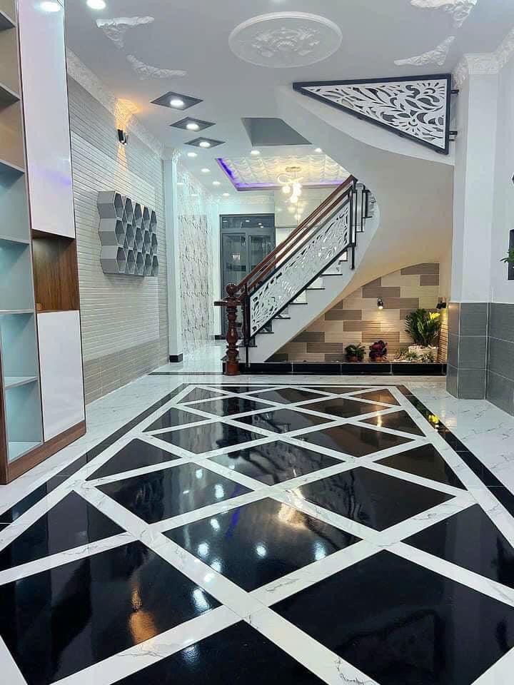 BÁN NHÀ 2 LẦU MẶT TIỀN HẺM XE HƠI 502 ĐƯỜNG HUỲNH TẤN PHÁT QUẬN 7