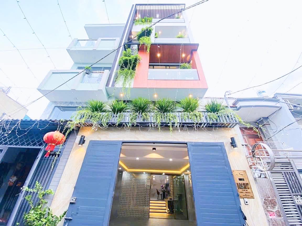 NHÀ LÊ ĐỨC THỌ MỚI LUNG LINH- 5 TẦNG- 5M x 17M - OTO NGỦ TRONG NHÀ.