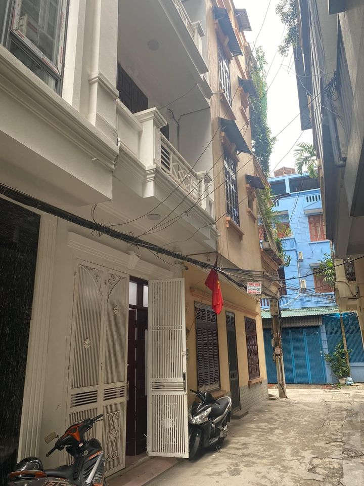 Bán nhà 5 tầng ngõ 4 Đặng Văn Ngữ Ô TÔ, S70 m, mặt tiền 6 m, giá 9,3 tỷ.