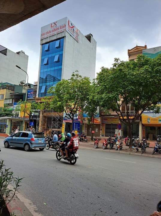 BÁN TÒA VĂN PHÒNG MẶT PHỐ KHUẤT DUY TIẾN DT 100m 9 TẦNG MT7m GIÁ 48.5 TỶ