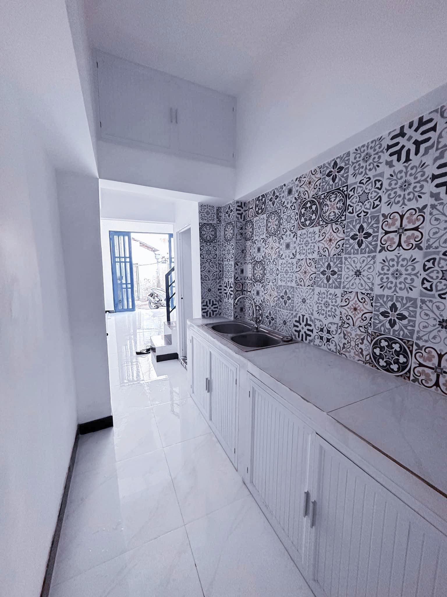 Nhà 2 mặt hẻm Hồ Hảo Hớn, Q1, 2 PN, sổ hồng riêng, giá 3,48 tỉ