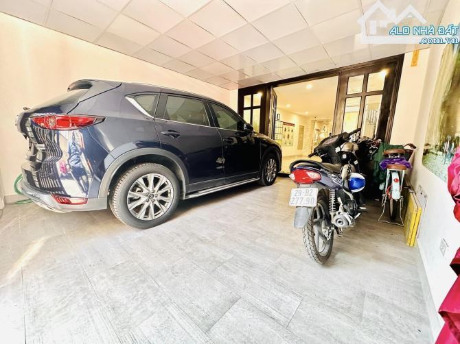 Nhà đẹp Gara ô tô phố Lý Nam Đế 75m2, 7T thang máy, MT5m, 2 thoáng đất lộc chủ Doanh Nhân