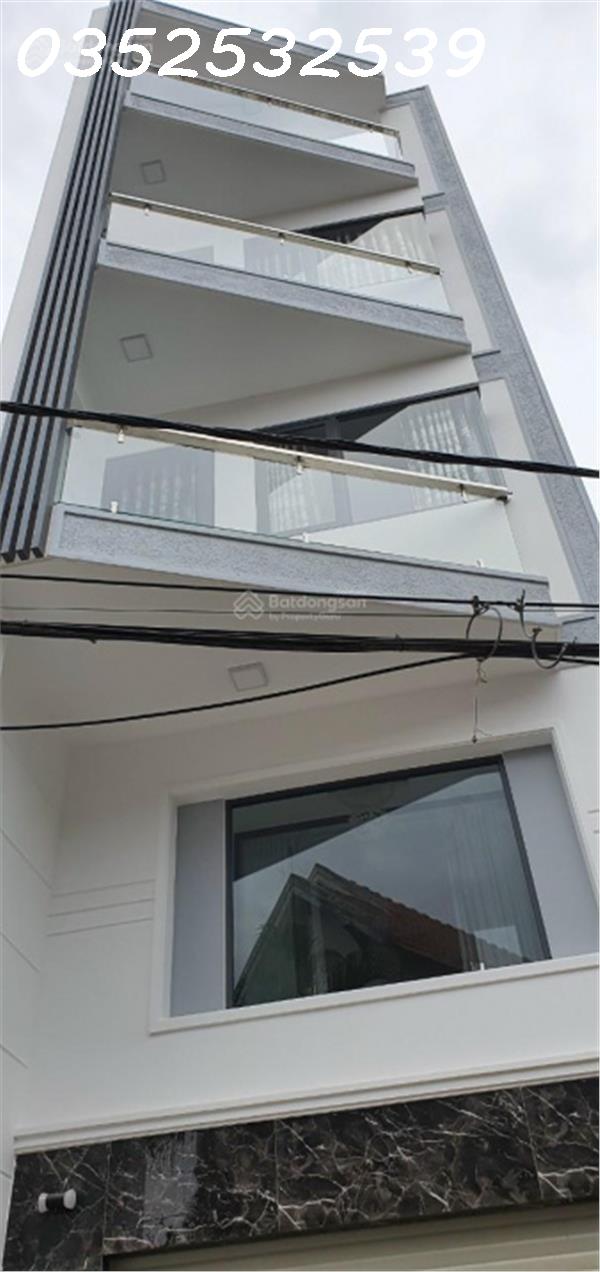 Bán nhà mới hẻm xe hơi gần Lê Quang Định, nhà 5 tấm(4PN, 5WC) ô tô đậu trong nhà 7tỷ