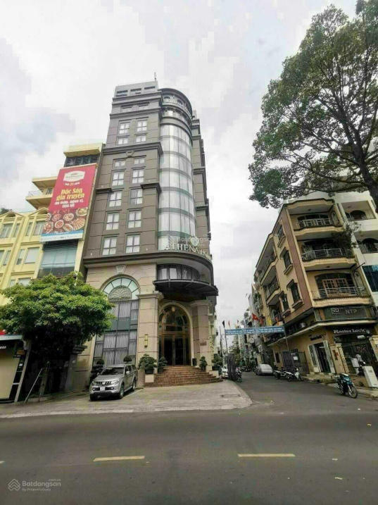 Bán tòa nhà góc 2 mặt tiền đường Trần Hưng Đạo - Diện tích 10x26m - Hầm 9 tầng - HĐ thuê 200Tr/th