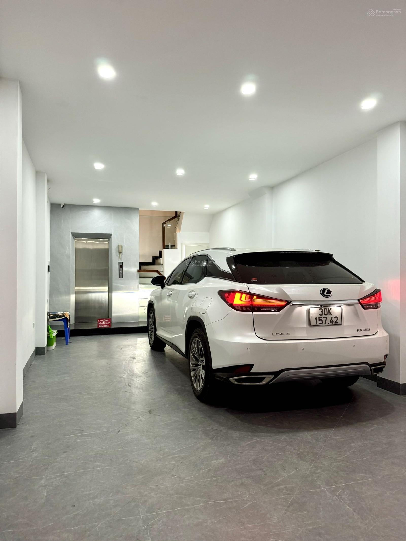 Bán nhà Ngọc Lâm - ngay cầu Chương Dương 65m2 7 tầng thang máy gara ô tô ở ngay.