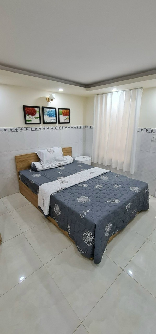 bán nhà giá rẻ có dòng tiền - 150m2 - Hiệp Thành - Quận 12- hẻm xe hơi 5m thông