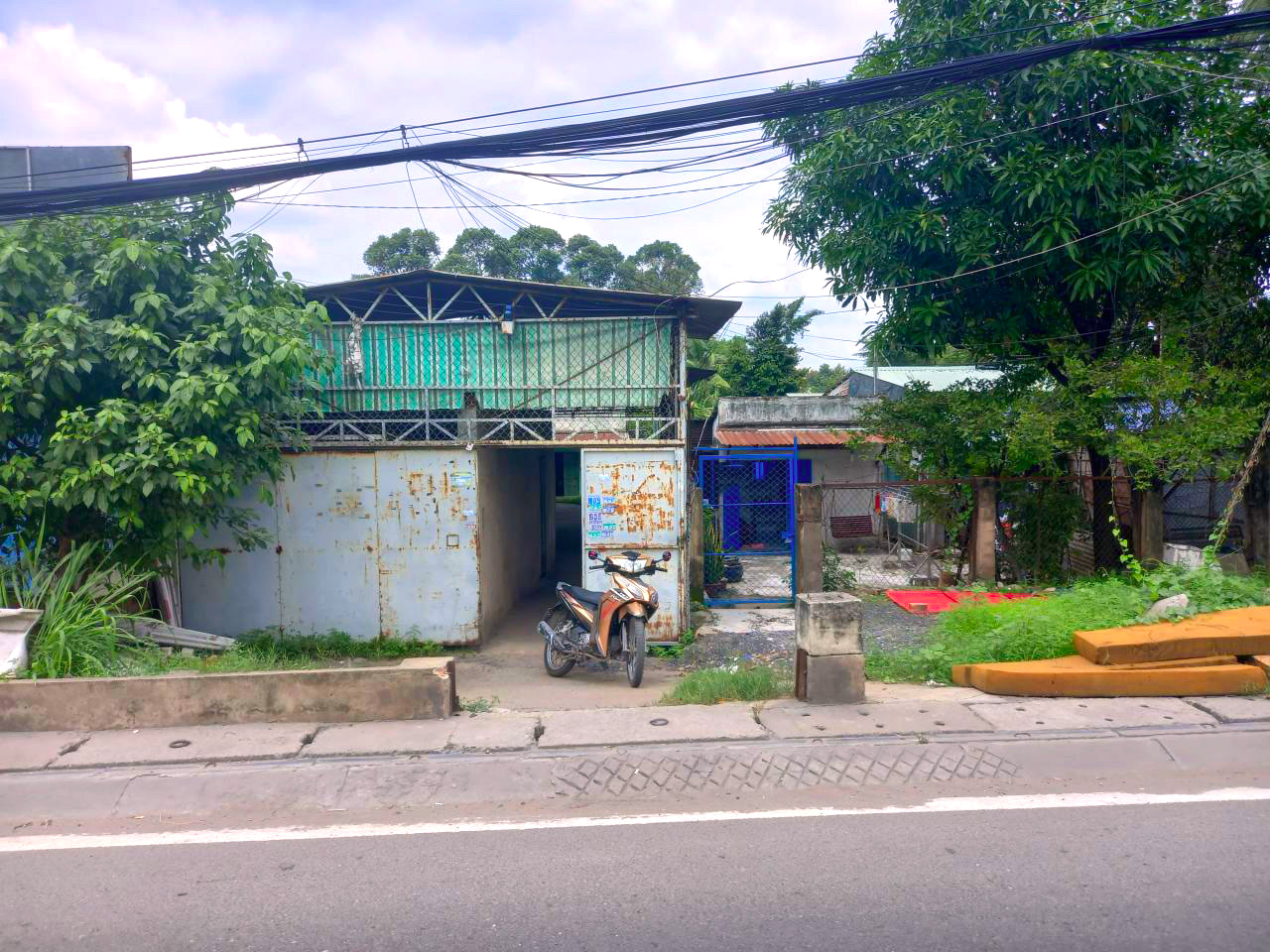 Bán nhà trọ MT Quốc Lộ 1A TĐ, 1720m2, ngang 11.5x105m, nở hậu 18.39m, Đ. 32m giá chỉ 8.x tỷ