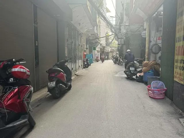 Bán Nhà Hoàng Cầu Đống Đa 57m2 5T MT 6,4M,LÔ Góc 2 Thoáng Ô Tô Tránh Kinh Doanh 11,5 Tỷ