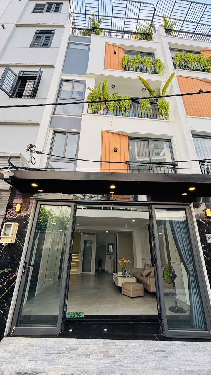 BÁN NHÀ GÒ VẤP THANG MÁY GIÁ 7TỶ2 5TẦNG Ô TÔ VÀO NHÀ MẶT TIỀN 5M NGAY EMART PHAN HUY ÍCH