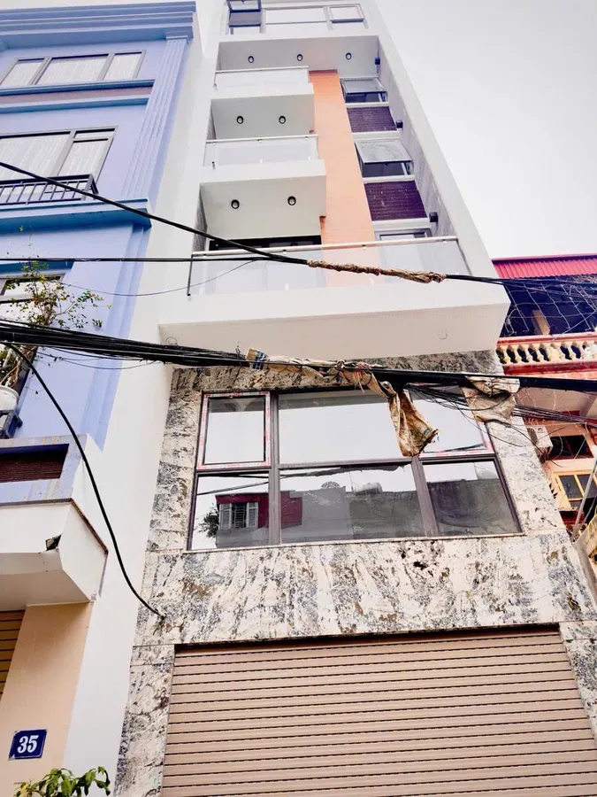 NHÀ ĐẸP 7 TẦNG KINH DOANH GARA Ô TÔ Phố Trạm 56m2 7 tầng X 18.2 tỷ Long Biên.