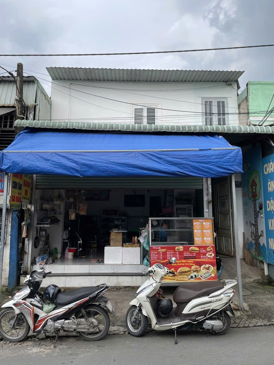 Bán nhà tại Dĩ An, Bình Dương, giá 5 tỷ, 150m2, sổ hồng riêng, 4 P. trọ, 1 ki ốp. Thu nhập 9tr/T