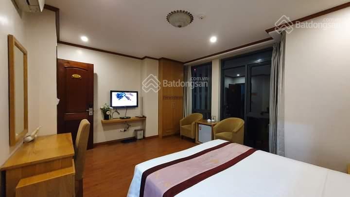 Bán gấp - tòa nhà khách sạn - Trần Thái Tông 137m2 x 9 tầng, MT 9m, 75 tỷ - dòng tiền 850tr/ tháng