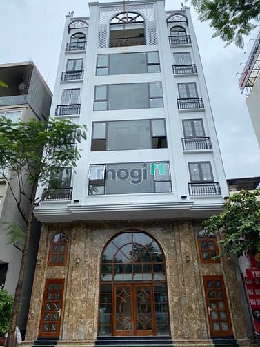 Chính chủ bán nhà 8 tầng mặt phố vũ phạm Hàm DT 80m MT 10m, 2 mặt đườn